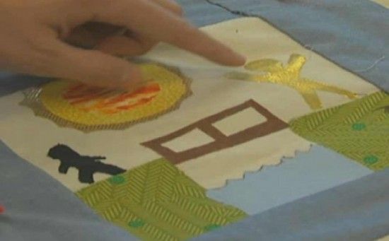 photo quilt-550x341_zpsacf5192d.jpg